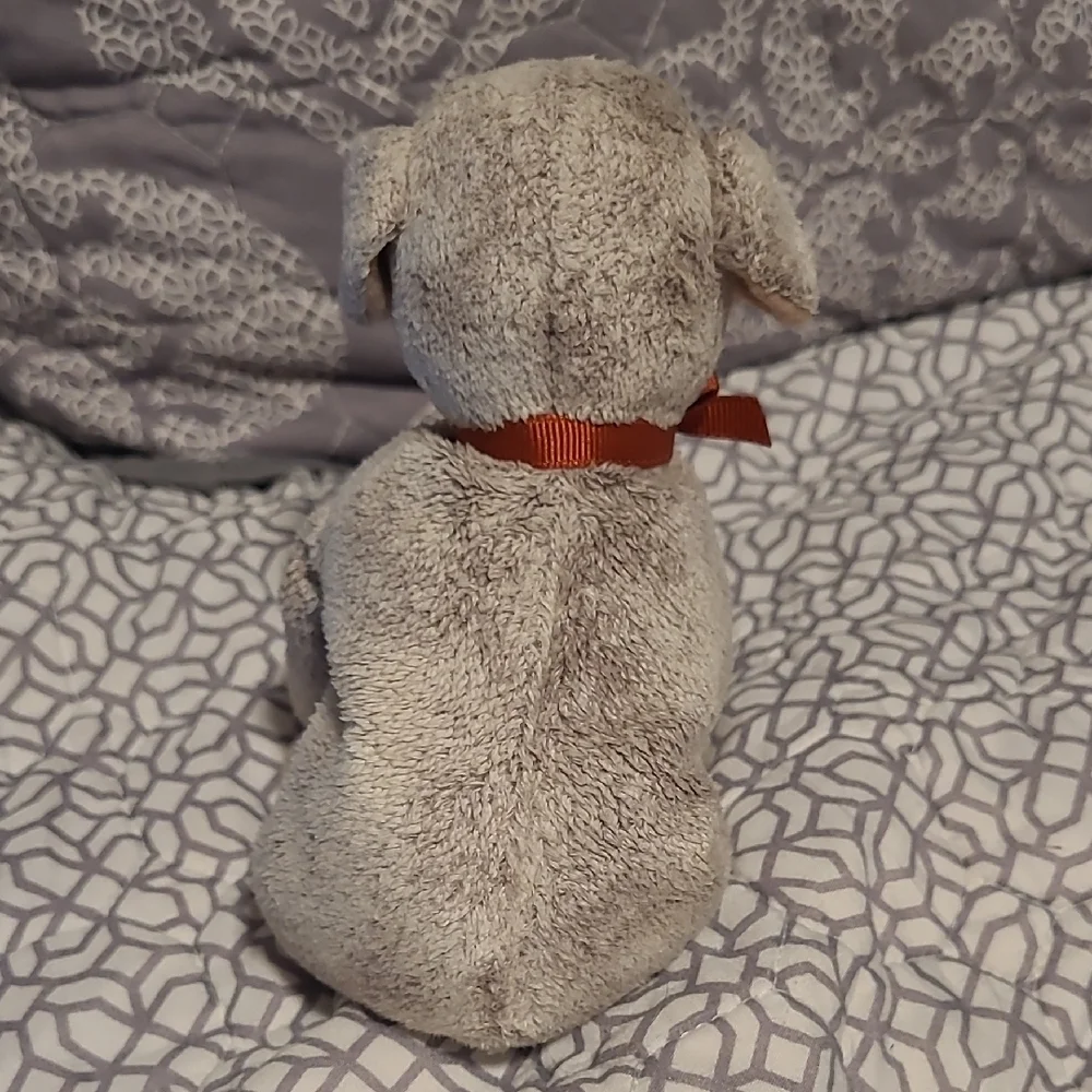 Plush Dog Toy with Red Bow